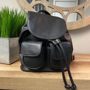 Mini Drawstring Flap Backpack